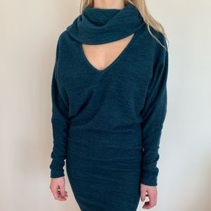 Long sleeve emerald green dress.